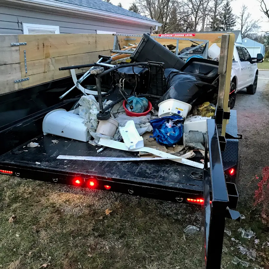 Roll-off dumpster delivered to a residential driveway in Bart